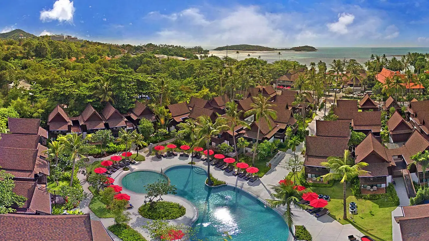 Aerial view of the resort's Thai-style pavilions and pool