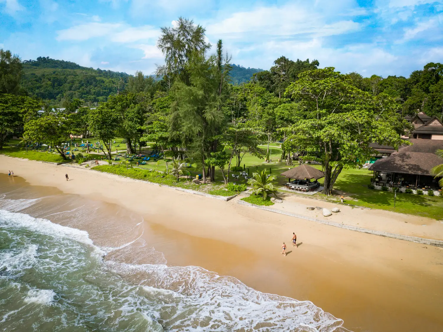 Resort lawns running down to the beach