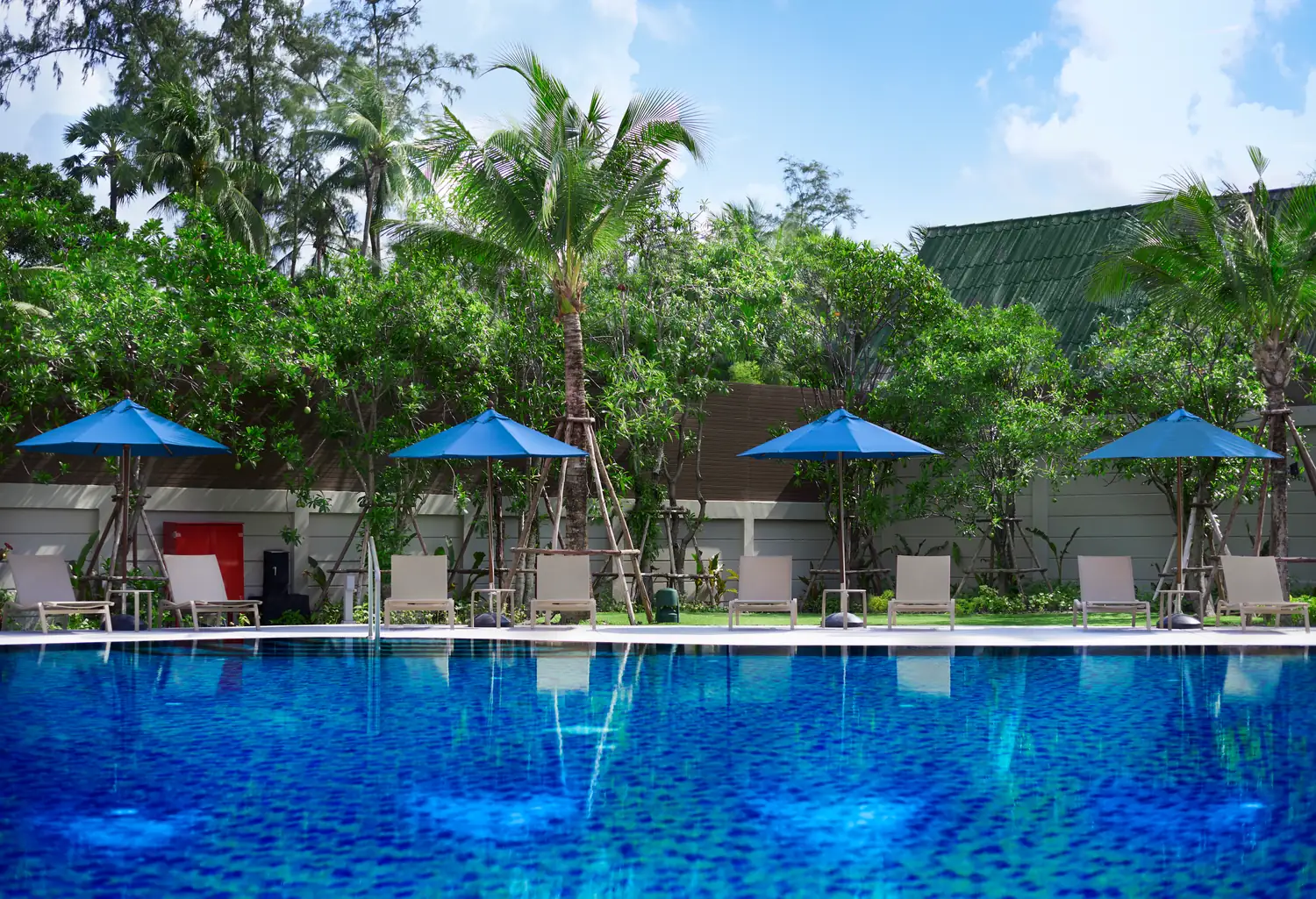 Main pool with blue parasols