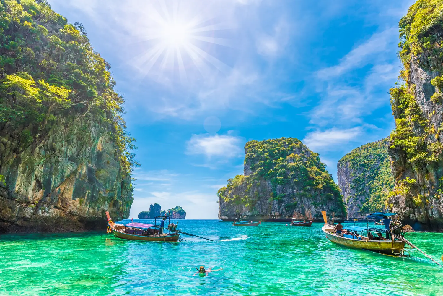 Longtail boats in Phi Phi's bays