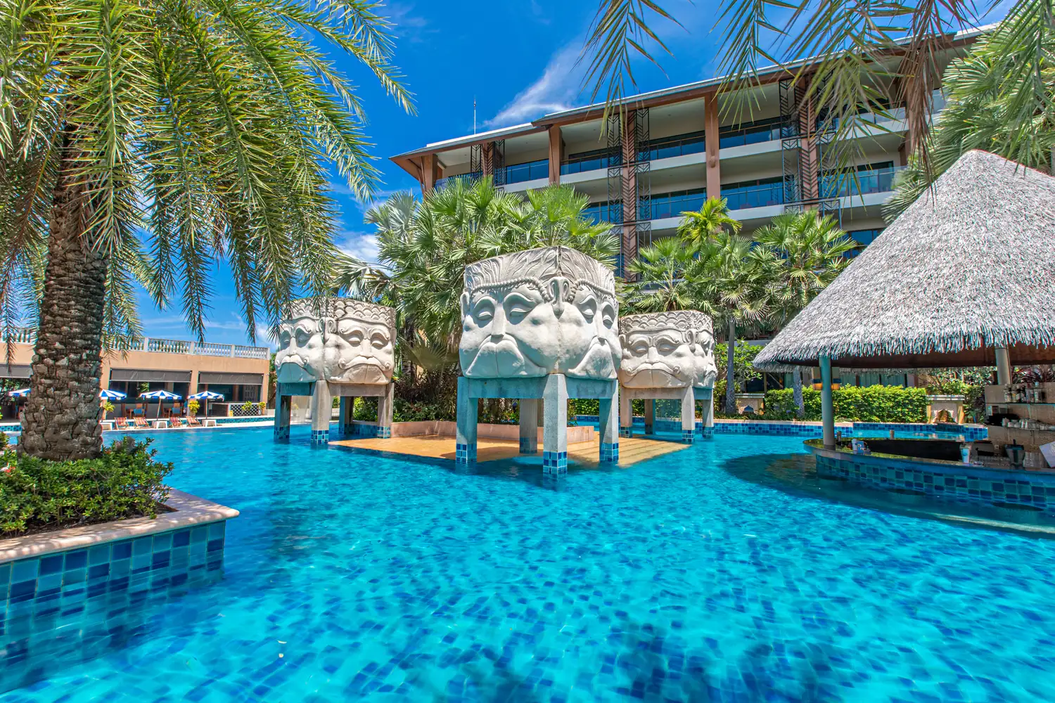 Swimming pool and sundeck at Rawai Palm Resort
