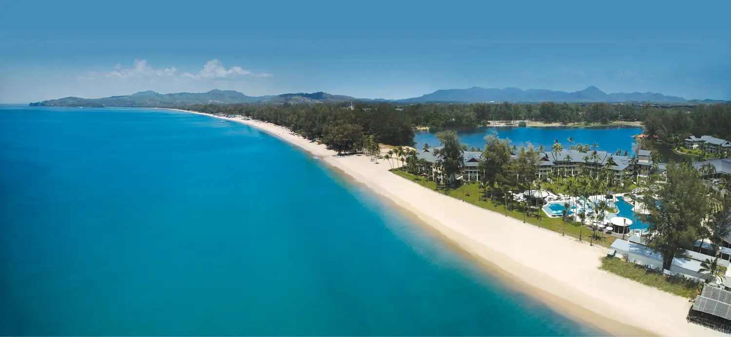 Resort and Bangtao Beach from the air at SAii Laguna Phuket