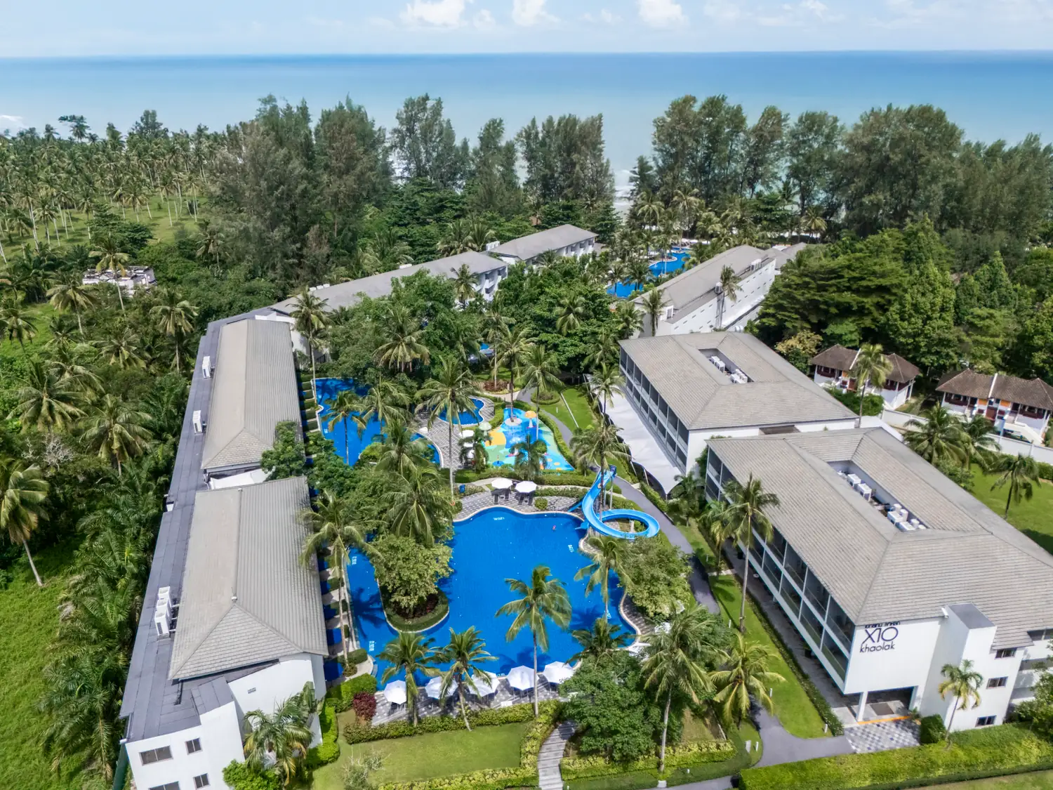 Sun loungers along the beachfront path